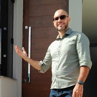 Corretor {{listing Broker().name}}