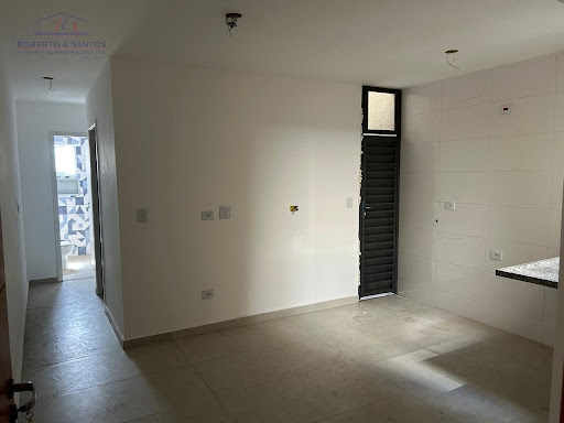 Sala conjugada com a cozinha
