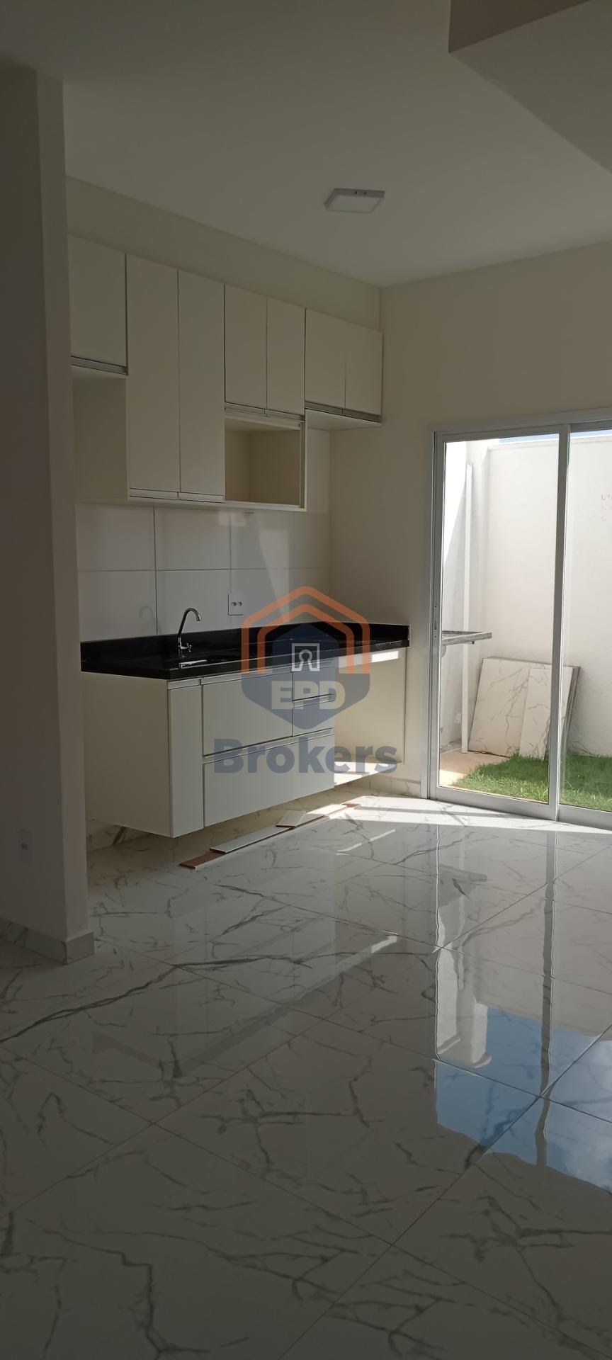 Cozinha integrada a sala de visitas