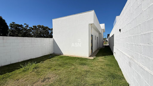 Perspectiva da área externa aos fundos