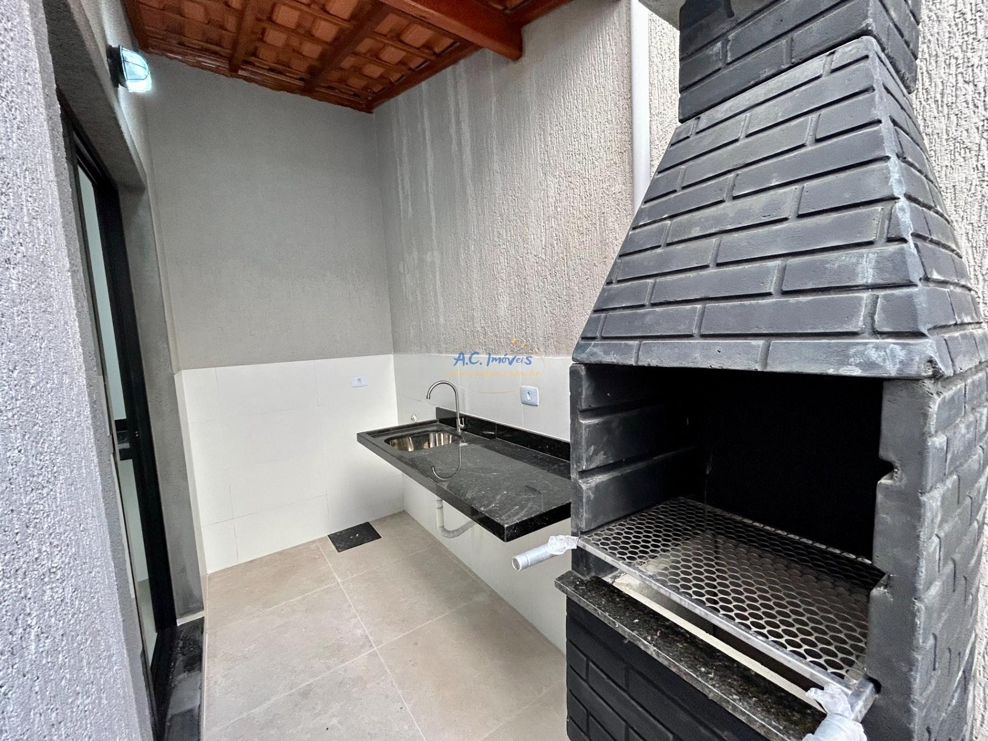 Casa à venda com 2 quartos, 2 suítes, 1 vaga e 60m² no Jardim Melvi, Praia Grande (SP) — foto 9 de 30