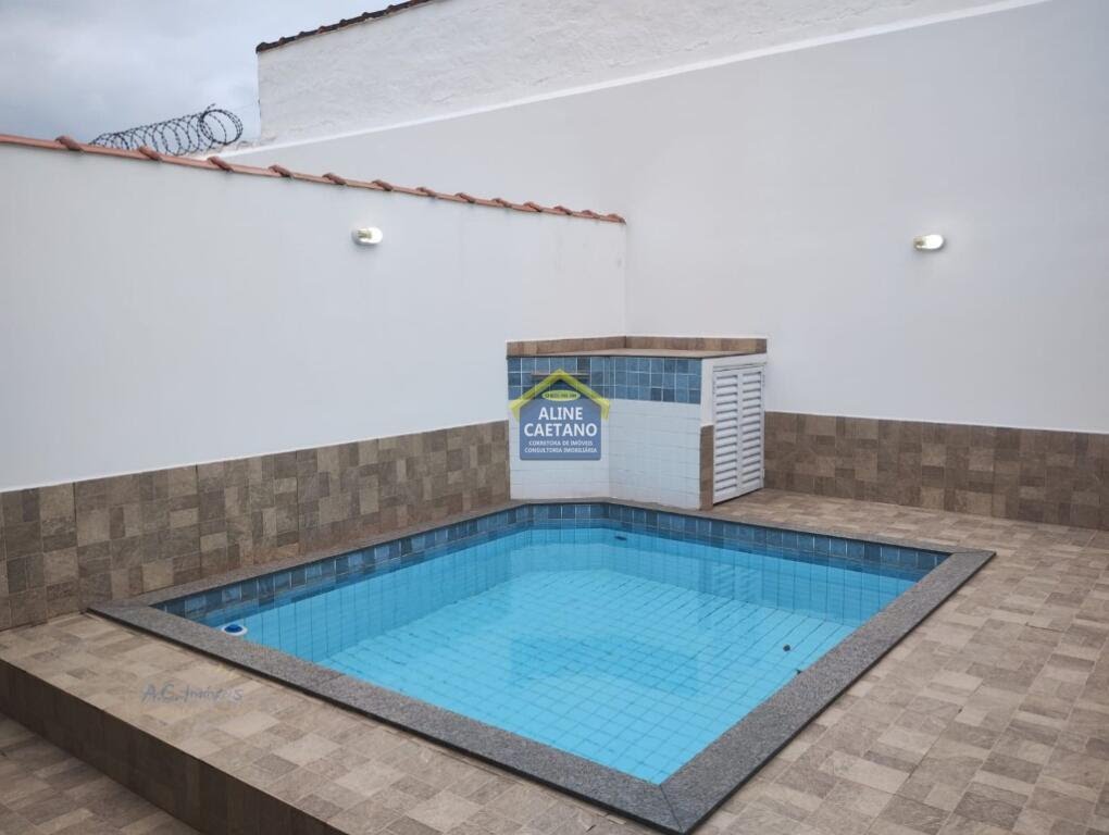 Casa à venda com 2 quartos, 2 banheiros, 2 vagas e 75m² no Vilamar, Praia Grande — foto principal
