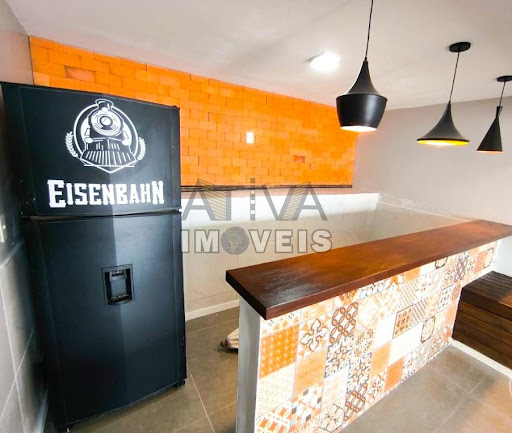 Área de festas com espaço gourmet