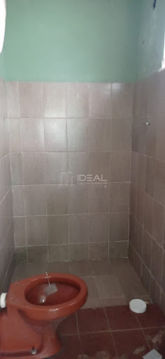 Ótima casa para fins residenciais ou comerciais, toda gradeada, com 3 quartos, 02 banheiros, sala cozinha, garagem para 02 carros cód. 15906